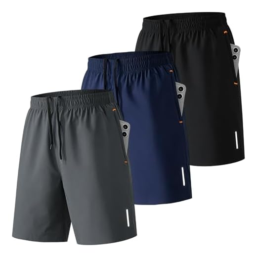SHAGGA Paquete de 3 pantalones cortos de gimnasio para hombre, ligeros, de secado rápido, entrepierna corta, 7 con bolsillos con cremallera para correr, fitness y joggers, Paquete de 3 (negro, azul