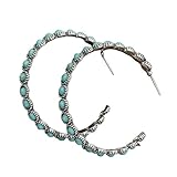 Bleu-vert qui illumine le teint et rehausse les looks