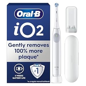 Oral-B iO2 Electric Toothbrush, 1 Gentle Care Toothbrush Head, 1 Travel Case, 1 Travel Refill Holder, Toothbrush for Adults (Simple White), Designed by Braun, 2 Pin UK Plug