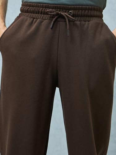 Image of Bewakoof Men's Solid Super Loose Fit Cotton Blend Joggers