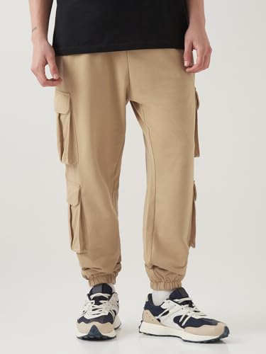 Image of Bewakoof Men's Cotton Super Loose Fit Joggers|Bewakoof Air 1.0 | Track pants for man | Lower for man | Trouser for men | Baggy trackpants for men | Multipurpose | Mens Lower Activewear | Utility Pockets | Lightweight & Flexible Elastic Waist | Casual Joggers | Loose Fit