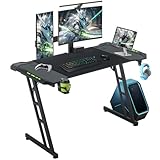Bureau Gaming Spacieux et Ergonomique: Conçu pour les passionnés de jeux vidéo, ce bureau gaming 120x60 offre une large surface pour accueillir tout type d’écran et améliorer votre expérience immersive. Grâce à l’espace généreux sous la table gaming, les joueurs peuvent s’installer confortablement et rester concentrés. C’est également une solution idéale pour le travail ou les études, faisant de ce bureau gaming un cadeau parfait pour les enfants, amis, et amateurs de gaming.