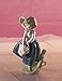LLADRÓ Glossy Porcelain Figure Pretty Pickings of a Girl. Decorative Porcelain Figurine of a Little Girl with Flowers.