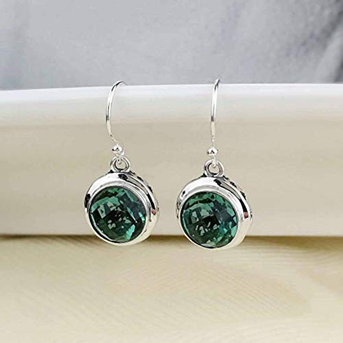 Argent 925 et cristal vert pour ces boucles d'oreilles de style chinois