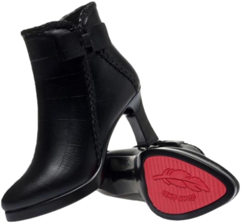 Lady's pointed-toe, thick-soled, bow-shaped ankle boots, made of fashionable leather material. There is a zipper design on the side and the interior is lined with fur for warmth and comfort.