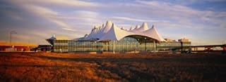 Clouded sky over an airport Denver International Airport Denver Colorado USA Poster Print (18 x 7)