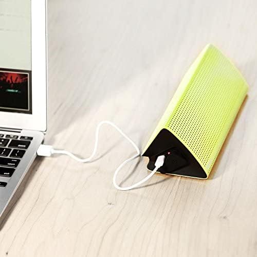 Remax RB-M7 speaker connected to a laptop for charging