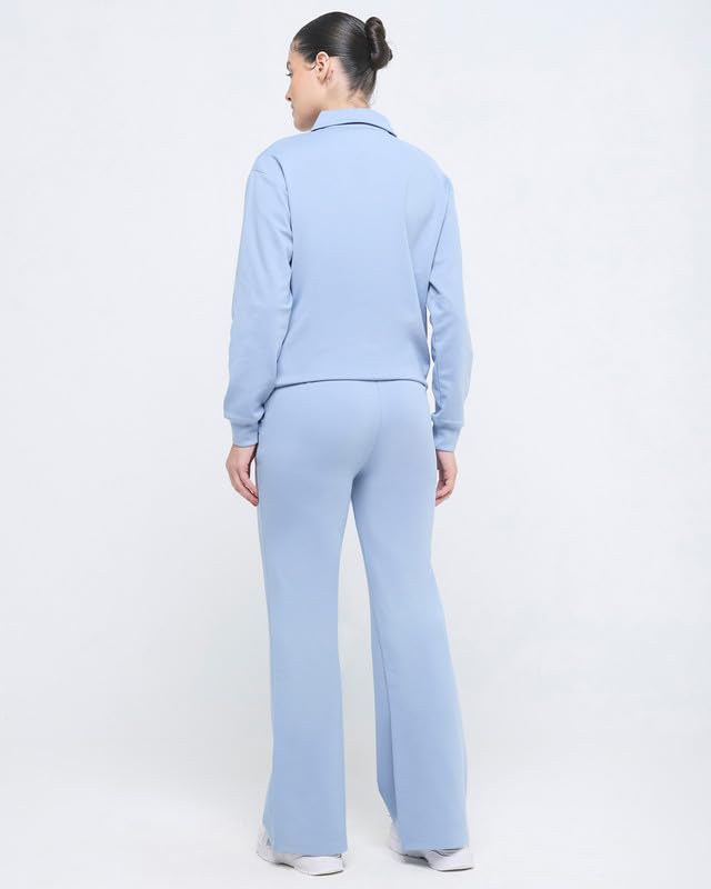 Image of HUNNIT Essential Flare Pants for Women with Zip Pockets | Mid Waist Solid Cotton Tapered Flare Pants | Bootcut Flared Trousers with Wide Elastic Waistband | Relaxed Fit Flared Trouser