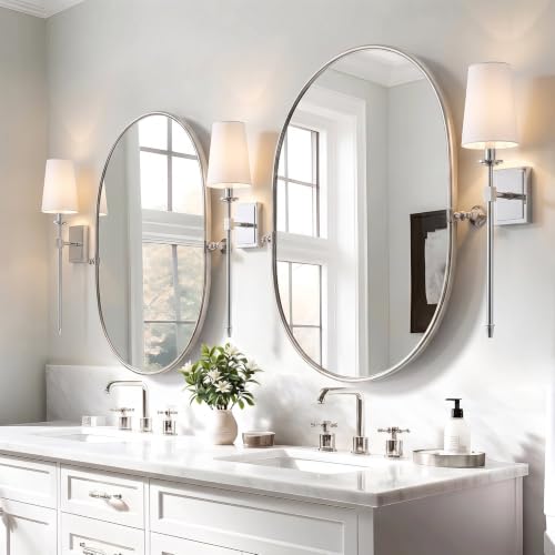 Image of Kira Home Torche 20 inch Mid Century Modern Wall Sconce for Bathroom Vanity | Tapered White Linen Shade, Chrome Candle Wall Light with Elongated Tail, Chrome Finish