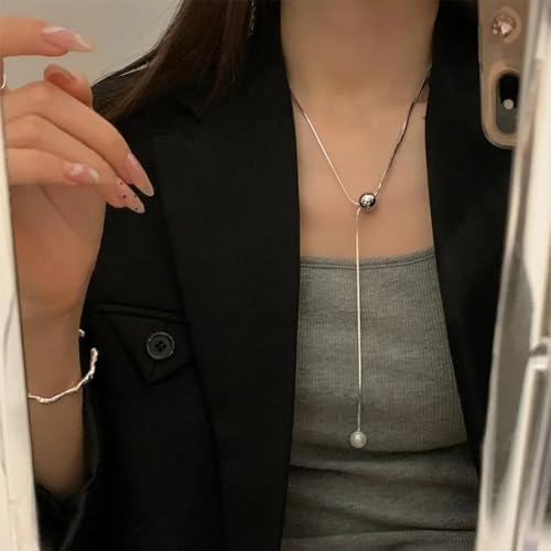 Long collier pull à pompons et strass pour femmes mode automne-hiver