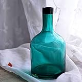 Este moderno jarrón de cristal azul en una forma bulbosa puede decorar todo el año y el aspecto va muy bien con decoraciones de época o de decoraciones de flores de verano