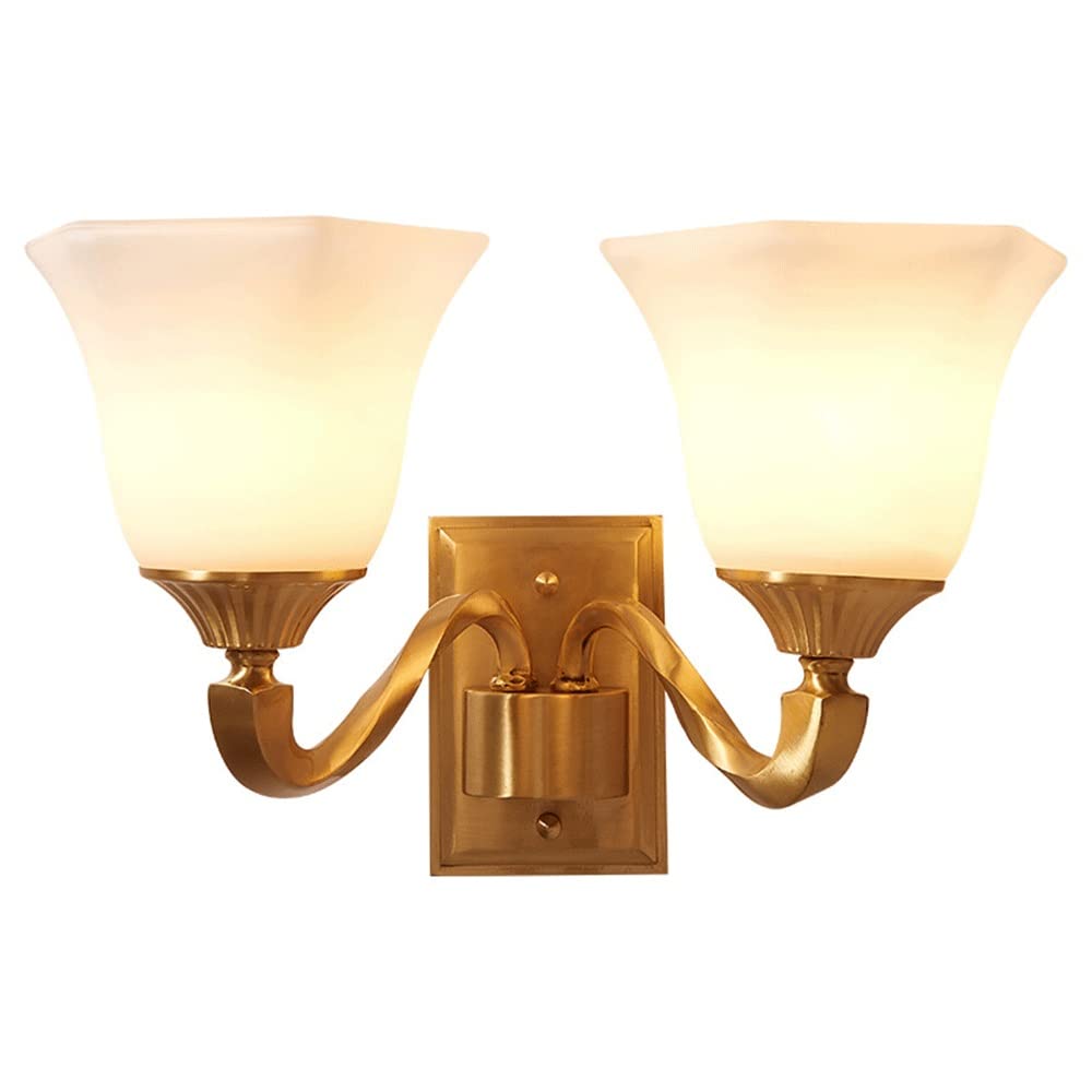 Apliques de oro vintage para iluminar salones oscuros y zonas de paso interiores