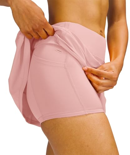 Image of MEIVSO Women's Pleated Workout Tennis Skirts with Pockets Activewear Sports Skort Built-in Shorts