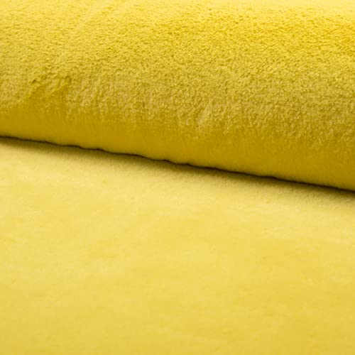 Tissu de luxe en fausse fourrure jaune pour plaid et décoration cocooning
