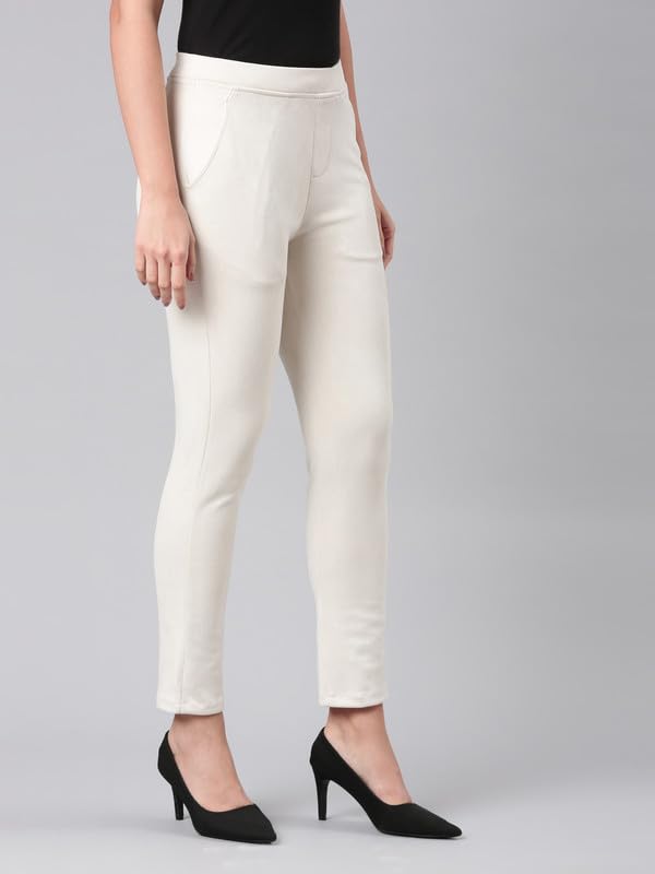 Image of GO COLORS Women Solid Mid Rise Suede Treggings