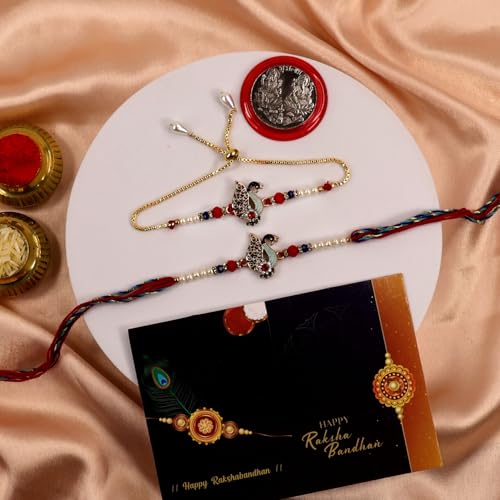 Image of Oblivion Rakhi Set for Brother and Bhabhi - Peacock with Feather Gift for Bhai & Lumba for Bhabhi with Silver Colour Coin and Greeting Card - Raksha Bandhan Combo