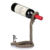 ? Simplemente coloque la botella de vino en el círculo erior de la cuerda que parece flotar en el aire, no requiere ensamblaje.