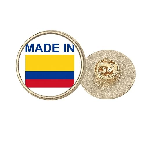 Broche ronde en métal doré Colombie M au raffinement unique et finitions dorées