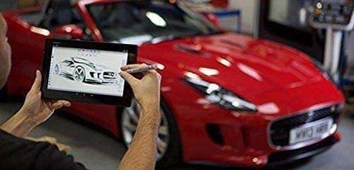A person holding a tablet with the Broonel Stylus, sketching a car design, with a red sports car in the background.