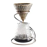 Uno strumento essenziale per creare una deliziosa tazza di caffè. contenitore per caffè in vetro