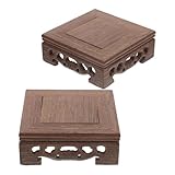 Décoration orientale raffinée : cette étagère décorative en bois apporte une touche de charme à votre espace, sublimant l’esthétique de toute pièce grâce à son élégant support sculpté et sa beauté discrète. présentoirs en bois, supports à fleurs en bois