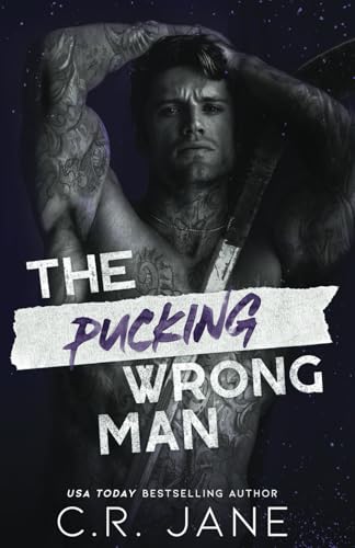 The Pucking Wrong Man: A Hockey Romance (The Pu... 1039498035 Book Cover