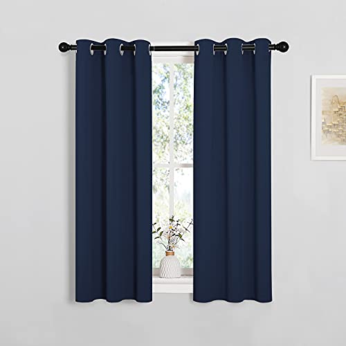 Image of NICETOWN Blackout Draperies Curtains, All Season Thermal Insulated Solid Grommet Top Blackout Curtains /Drapes for Kid's Room (Navy, 1 Pair, 29 x 45 Inch)