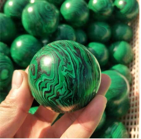 Boule de malachite et quartz vert pour harmoniser l'ambiance de votre salon