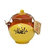 Tarro de Miel de Cerámica artesanal como la que se usaba antiguamente que contiene medio kilo de miel de flores. Ingredientes: Miel de mil flores.