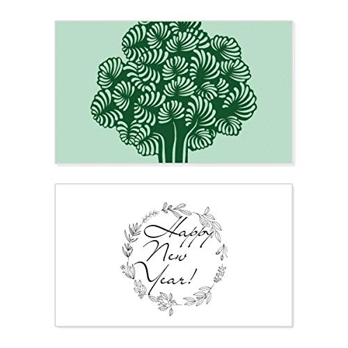 Tarjeta conmemorativa de año nuevo artesanal con motivos botánicos de hojas y flores