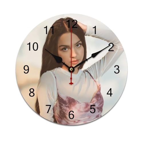 AFLJNYNN Olivia rodrigo - Reloj de pared de PVC ligero y silencioso diseñado con estilo minimalista y construcción sin marco, perfecto para paredes de dormitorio u oficina.