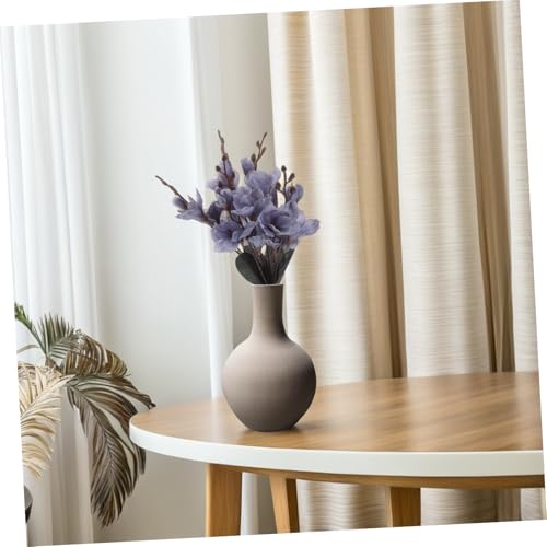 Ramas de magnolia artificial azul para transformar la decoración de habitaciones sin mantenimiento 7