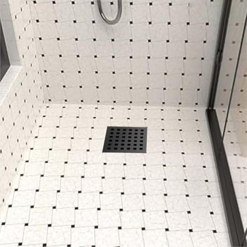 Évitez les obstructions avec cette bride de vidange de sol noire 10,2 cm - 7
