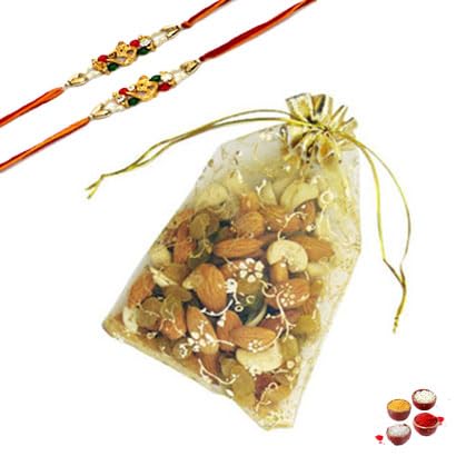 Image of Bay Nut Premium Rakhshabandhan /Rakhi Gift Hmaper Assortment Of Nuts & Dried Fruits 150gm, 2 rakhi, 2 choclates, kumkumchawal, greeting card (h-2)