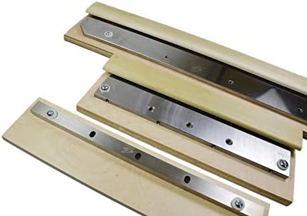 Image of three Polar paper cutting blades, each mounted on a wooden base, showing the metal blade with multiple screw holes.