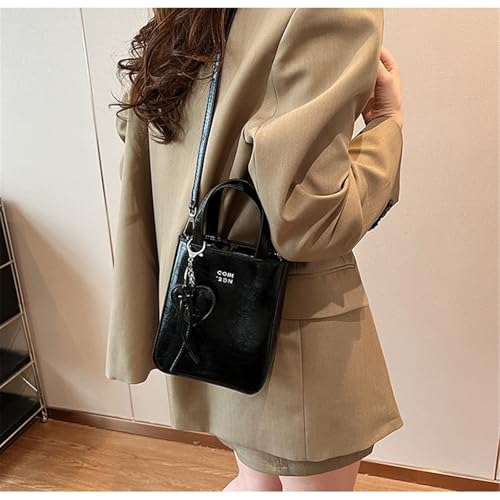 Sac à main tendance en cuir synthétique aux finitions haute couture