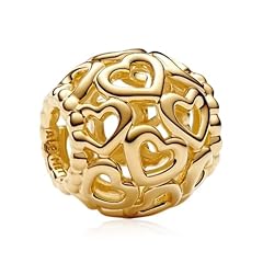 Golden hollow heart charm