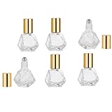 Klassische Glasflasche, die das ätherische Öl vor schädlichen UV-Strahlen schützt, um eine schnelle Verflüchtigung zu vermeiden.