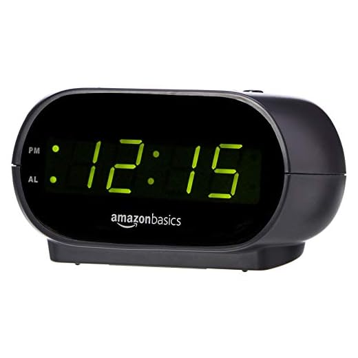 Amazon Basics Small Digital Oval Alarm Clock With LED Display, Nightlight & Battery Backup, Black, 4.5 x 3.5 x 2.4 Inches