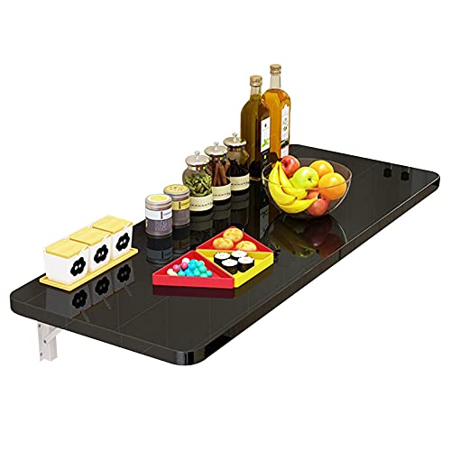 Table murale pliante pour rompre avec le désordre des petits studios - 2