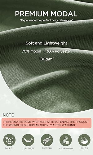 Image of ODODOS Soft Modal Long Sleeve Crop Top for Women with Thumb Hole Athletic Gym Workout Cropped Yoga Shirts