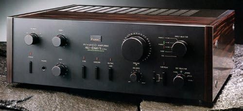 Front view of the Sansui AU-D607F EXTRA Integrated Amplifier, showing its black faceplate, various knobs, buttons, and input selectors.