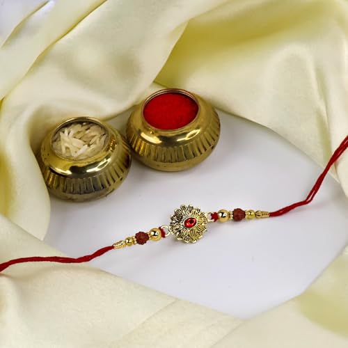 Image of Oblivion Ganesha and Floral Bloom Rakhi Set of 2 for Brother with Silver Colour Pooja Coin, Tilak Set and Greeting Card for Raksha Bandhan Celebration