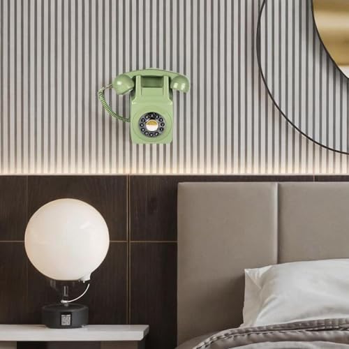 Teléfono antiguo de pared verde con cable para evitar interferencias y ruidos 4