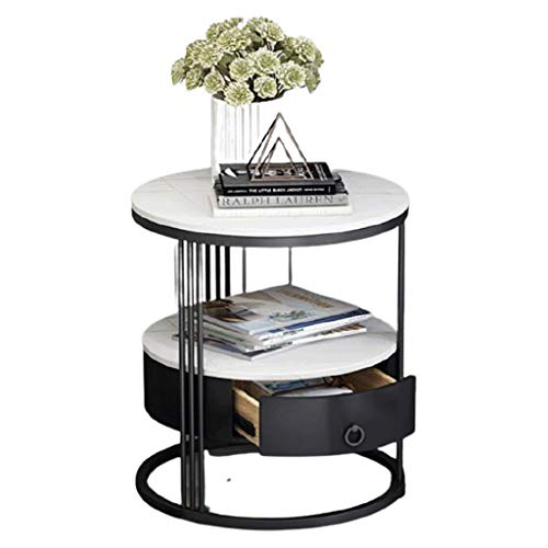 Table basse en marbre blanc avec tiroir pour optimiser l'espace du salon