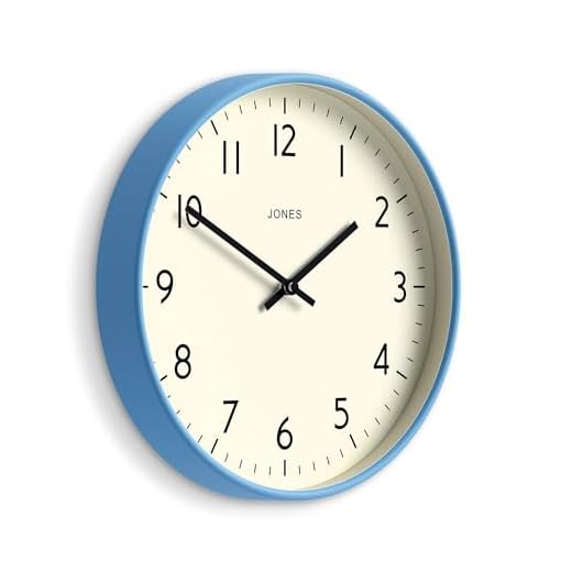 JONES CLOCKS® Studio Wall Clock | Modern Round Style | 12 inch | Mid Blue | Easy to Read Numbers | Versatile Design for Kitchen, Living Room or Office