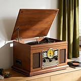 CONNEXION SANS FIL : Aucun système stéréo ni équipement supplémentaire n'est nécessaire. Installez-le et il fonctionne en quelques minutes. Son style rétro allié à la praticité de la technologie moderne fait de cette platine vinyle un excellent rapport qualité-prix, idéal pour les débutants comme pour les passionnés de vintage