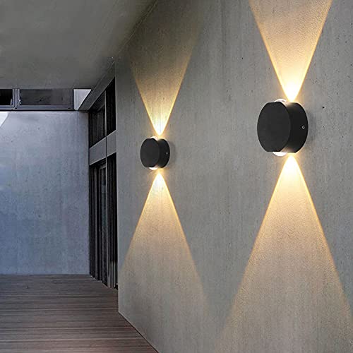 Aplique de pared para exteriores negro ideal para crear terrazas modernas con luz LED fría 5