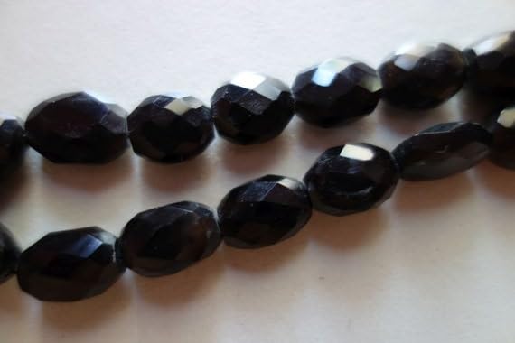 Onyx noir naturel en perles ovales facettées 11x13mm fil de pierres gemmes