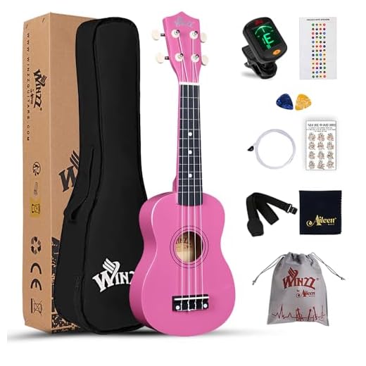 Winzz Ukelele Soprano Starter Kit para Principiante. Incluye: Funda, Afinador, Cuerdas Extra, Correa Ajustable, Púas, Pegatinas de notas, Guía de Acordes y Paño de Pulido. Color: Rosado
